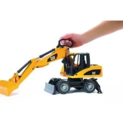 Bruder Hjulgrävare Grävmaskin Caterpillar med hjul 02445