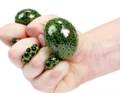 Klämboll Alienägg Fidget med mjuka svarta pärlor