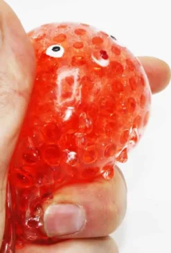 Klämlarv Squeeze Larv med mjuka pärlor Fidget 10 cm